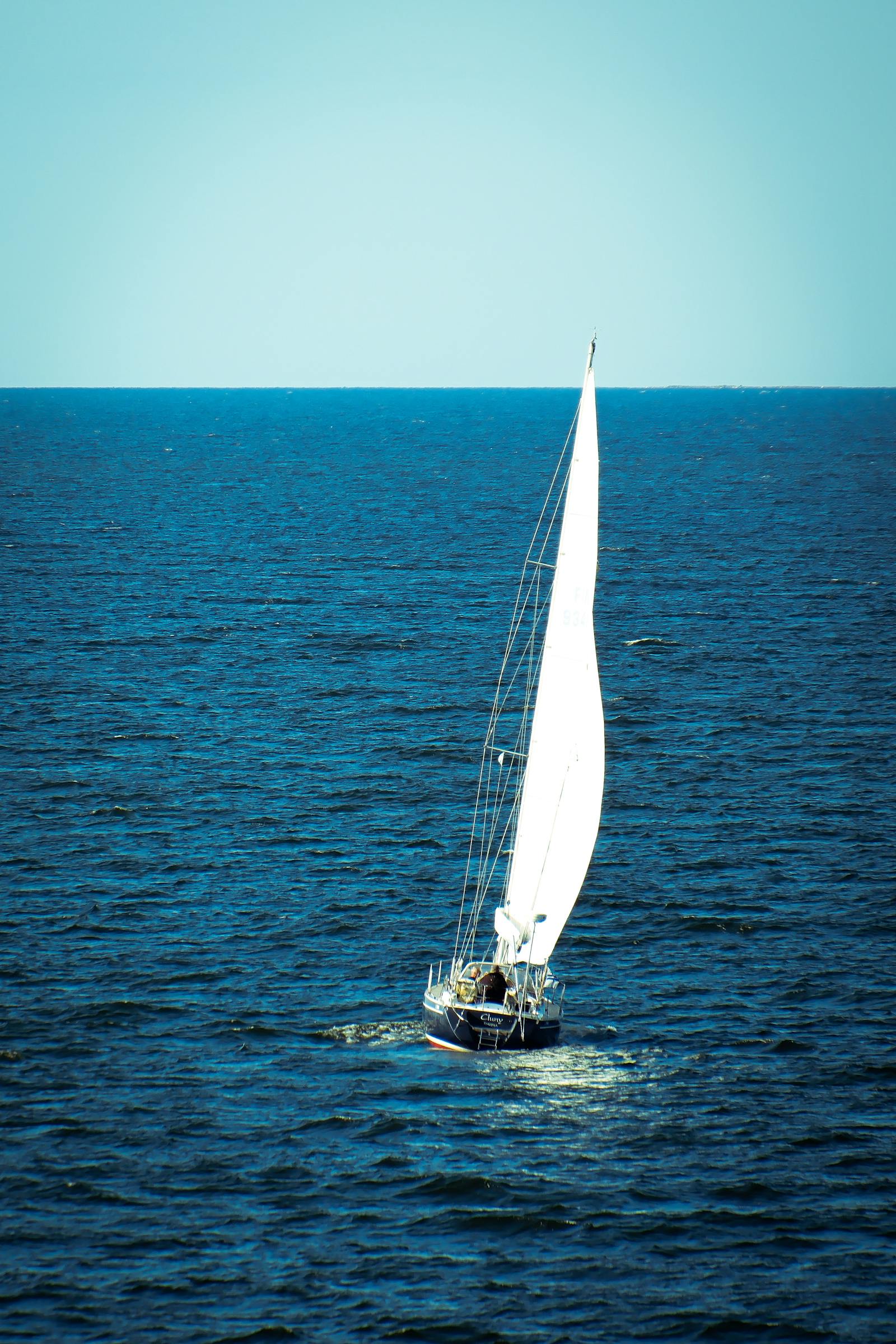 Sailing yacht in crystal clear waters